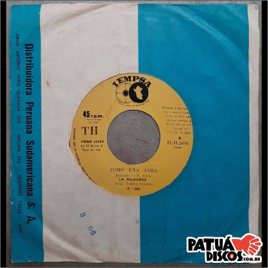 La Milagros - Como Una Loba / La Hoguera De Tus Años - 7"